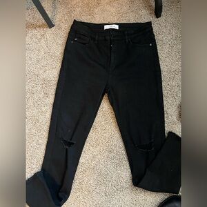 Kancan woman’s jeans skinny and distressed at knees size 11/29 in good condition